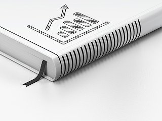 Image showing Finance concept: closed book, Growth Graph on white background