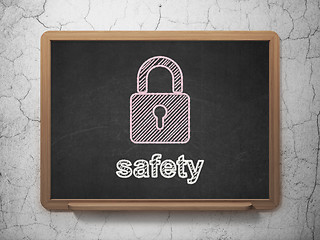 Image showing Privacy concept: Closed Padlock and Safety on chalkboard