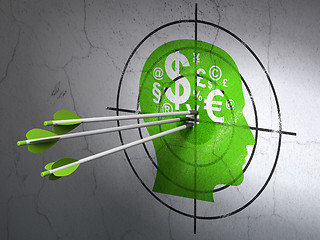 Image showing Business concept: arrows in Head With Finance Symbol target
