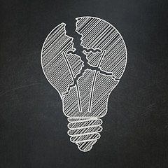 Image showing Finance concept: Light Bulb on chalkboard background