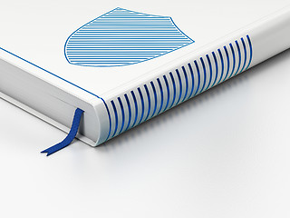 Image showing Security concept: closed book, Shield on white background