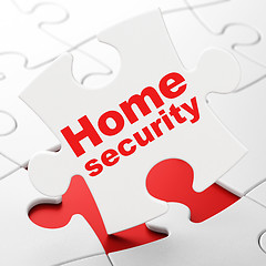 Image showing Safety concept: Home Security on puzzle background