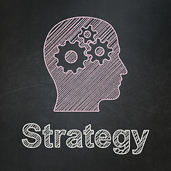 Image showing Finance concept: Head With Gears and Strategy on chalkboard