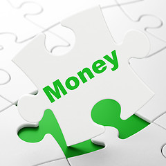 Image showing Finance concept: Money on puzzle background