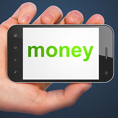 Image showing Finance concept: Money on smartphone