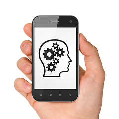 Image showing Finance concept: Head With Gears on smartphone