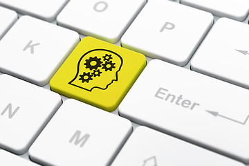 Image showing Finance concept: Head With Gears on computer keyboard background