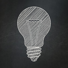 Image showing Business concept: Light Bulb on chalkboard background