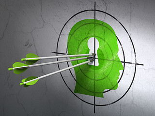 Image showing Education concept: arrows in Head With Keyhole target on wall