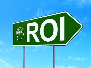 Image showing Finance concept: ROI and Head With Finance Symbol on sign