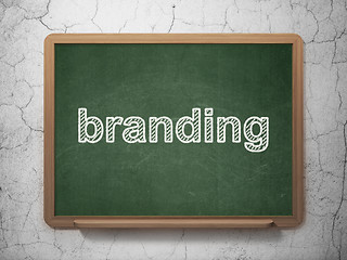 Image showing Marketing concept: Branding on chalkboard background