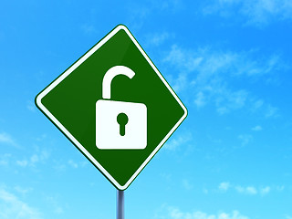 Image showing Safety concept: Opened Padlock on road sign background