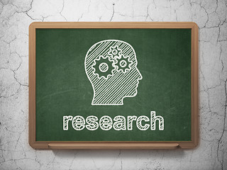 Image showing Marketing concept: Head With Gears and Research on chalkboard