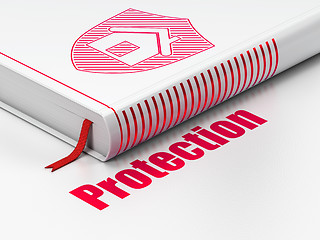 Image showing Safety concept: book Shield, Protection on white background