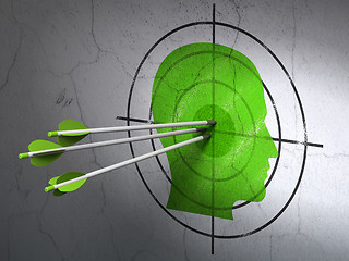 Image showing Business concept: arrows in Head target on wall background