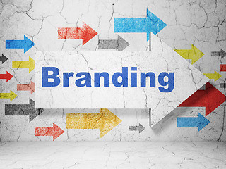 Image showing Marketing concept: arrow with Branding on grunge wall background