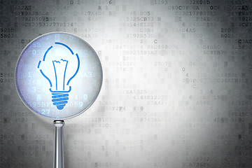 Image showing Finance concept:  Light Bulb with optical glass on background