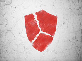 Image showing Safety concept: Broken Shield on wall background