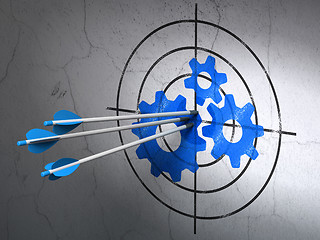 Image showing Data concept: arrows in Gears target on wall background