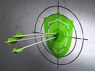 Image showing Privacy concept: arrows in Shield target on wall background