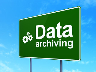 Image showing Data concept: Data Archiving and Gears on road sign background