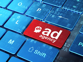 Image showing Advertising concept: Head With Gears and Ad Agency on keyboard