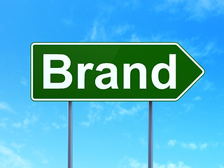 Image showing Advertising concept: Brand on road sign background