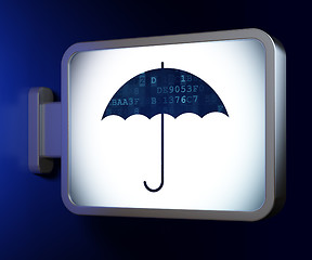 Image showing Safety concept: Umbrella on billboard background