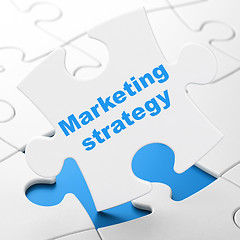 Image showing Advertising concept: Marketing Strategy on puzzle background