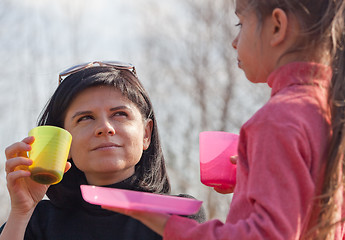 Image showing Mother and daughter  resting