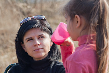 Image showing Mother and daughter  resting