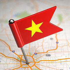 Image showing Vietnam Small Flag on a Map Background.