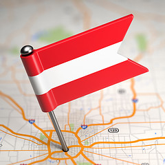 Image showing Austria Small Flag on a Map Background.