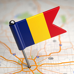 Image showing Romania Small Flag on a Map Background.