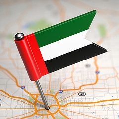 Image showing UAE Small Flag on a Map Background.