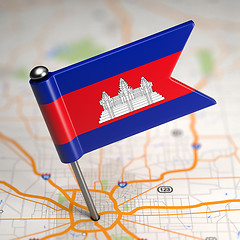 Image showing Cambodia Small Flag on a Map Background.