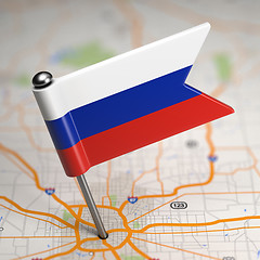 Image showing Russia Small Flag on a Map Background.