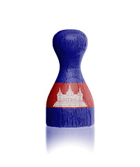 Image showing Wooden pawn with a flag painting