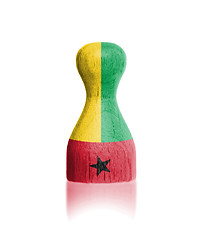 Image showing Wooden pawn with a flag painting