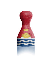 Image showing Wooden pawn with a flag painting