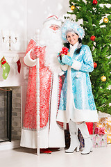 Image showing Snow maiden and santa claus