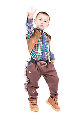 Image showing Little boy posing in cowboy costumes