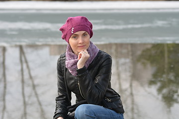 Image showing Woman in pink beret and black leather jacket 