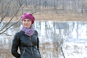 Image showing Woman in pink beret and black leather jacket