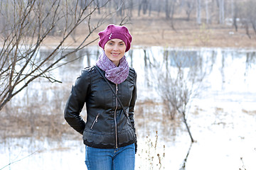 Image showing Woman in pink beret and black leather jacket