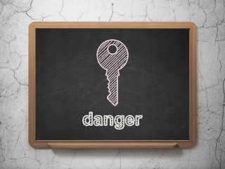 Image showing Privacy concept: Key and Danger on chalkboard background