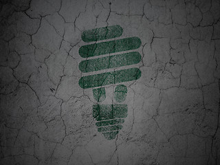 Image showing Business concept: Energy Saving Lamp on grunge wall background