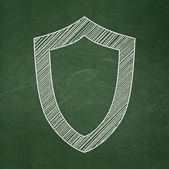 Image showing Security concept: Contoured Shield on chalkboard background