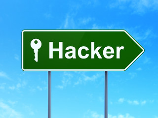 Image showing Safety concept: Hacker and Key on road sign background