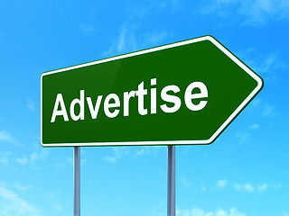 Image showing Advertising concept: Advertise on road sign background